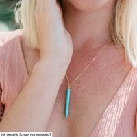 Long Dyed Turquoise Howlite Round Spike Point Pendant