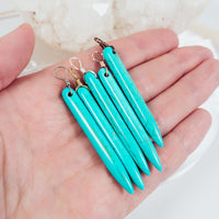 Long Dyed Turquoise Howlite Round Spike Point Pendant