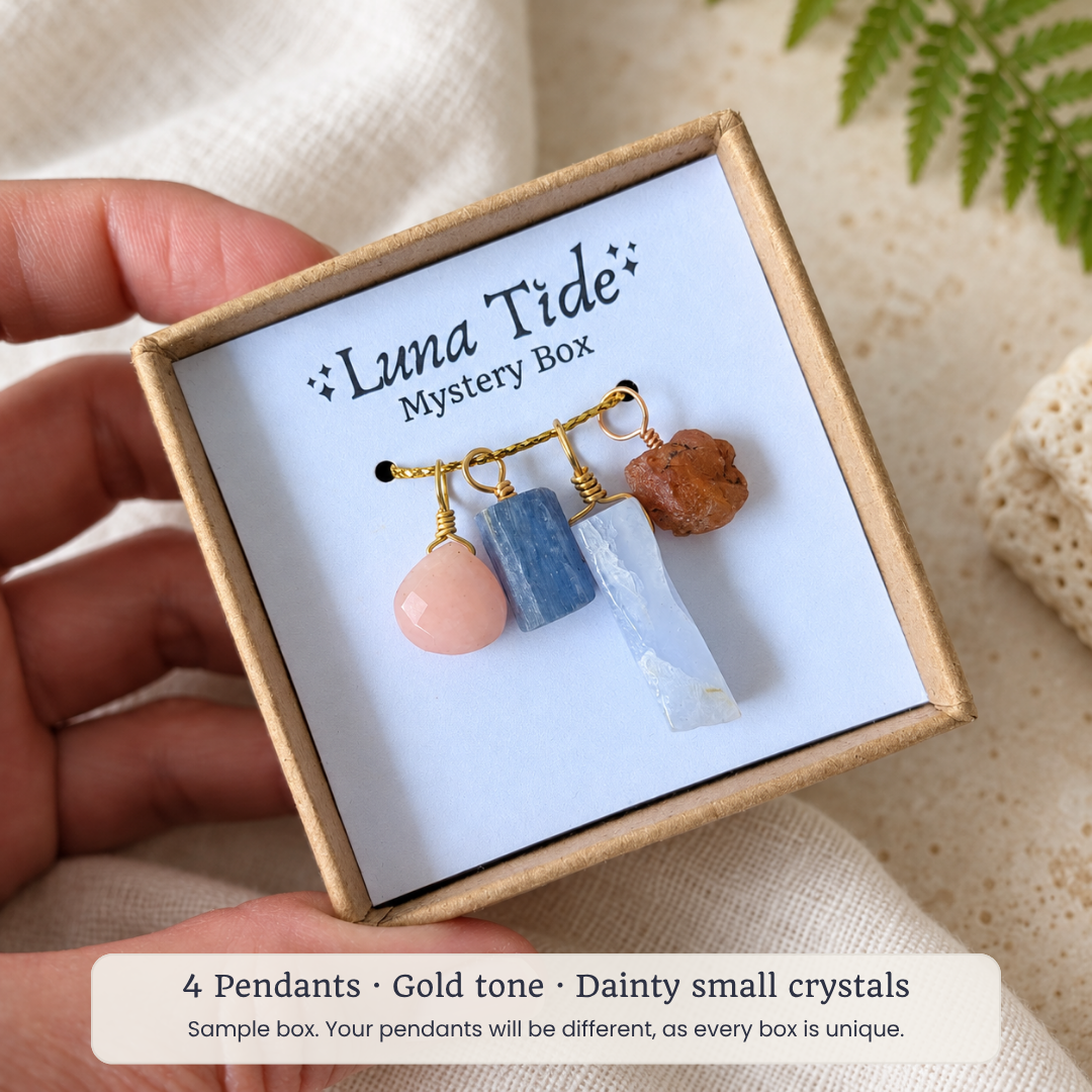 Sample Luna Tide mystery box with 4 gold tone dainty crystal pendants
